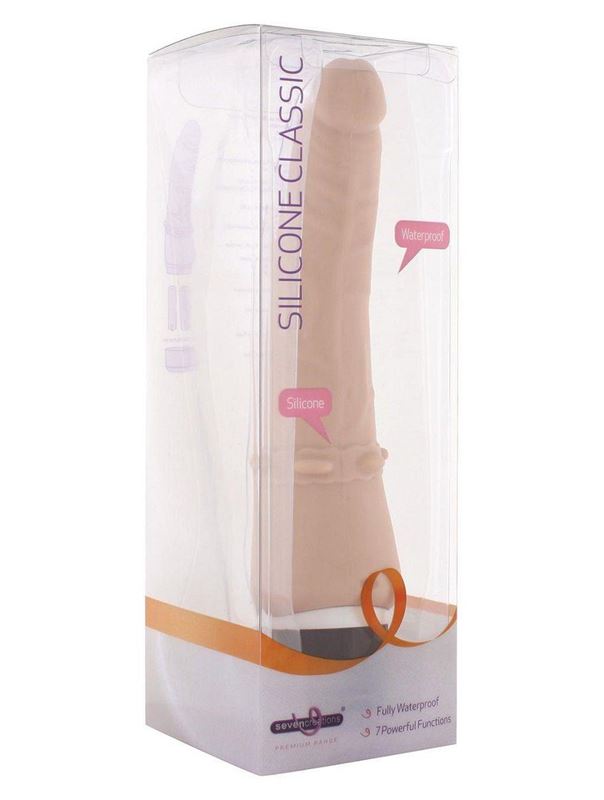 Телесный вибромассажёр с юбочкой шипов Classic Smooth Vibrator Nude - 16,5 см.