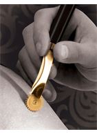 Золотисто-черное колесо Вартенберга Wartenberg Wheel