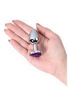 Серебристая коническая анальная пробка с фиолетовым кристаллом-сердечком - 7 см.